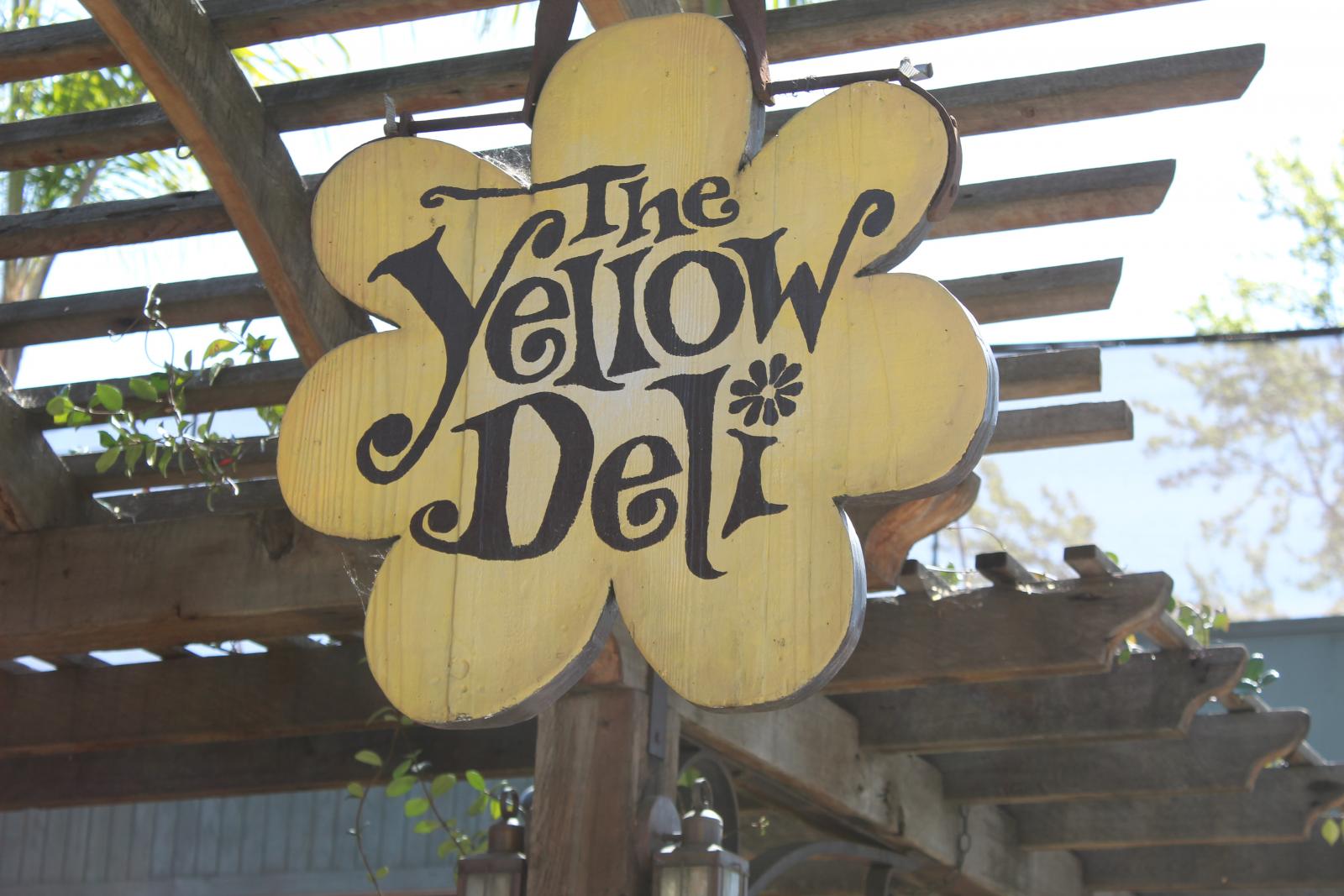 Yellow deli sign