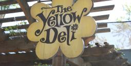 Yellow deli sign