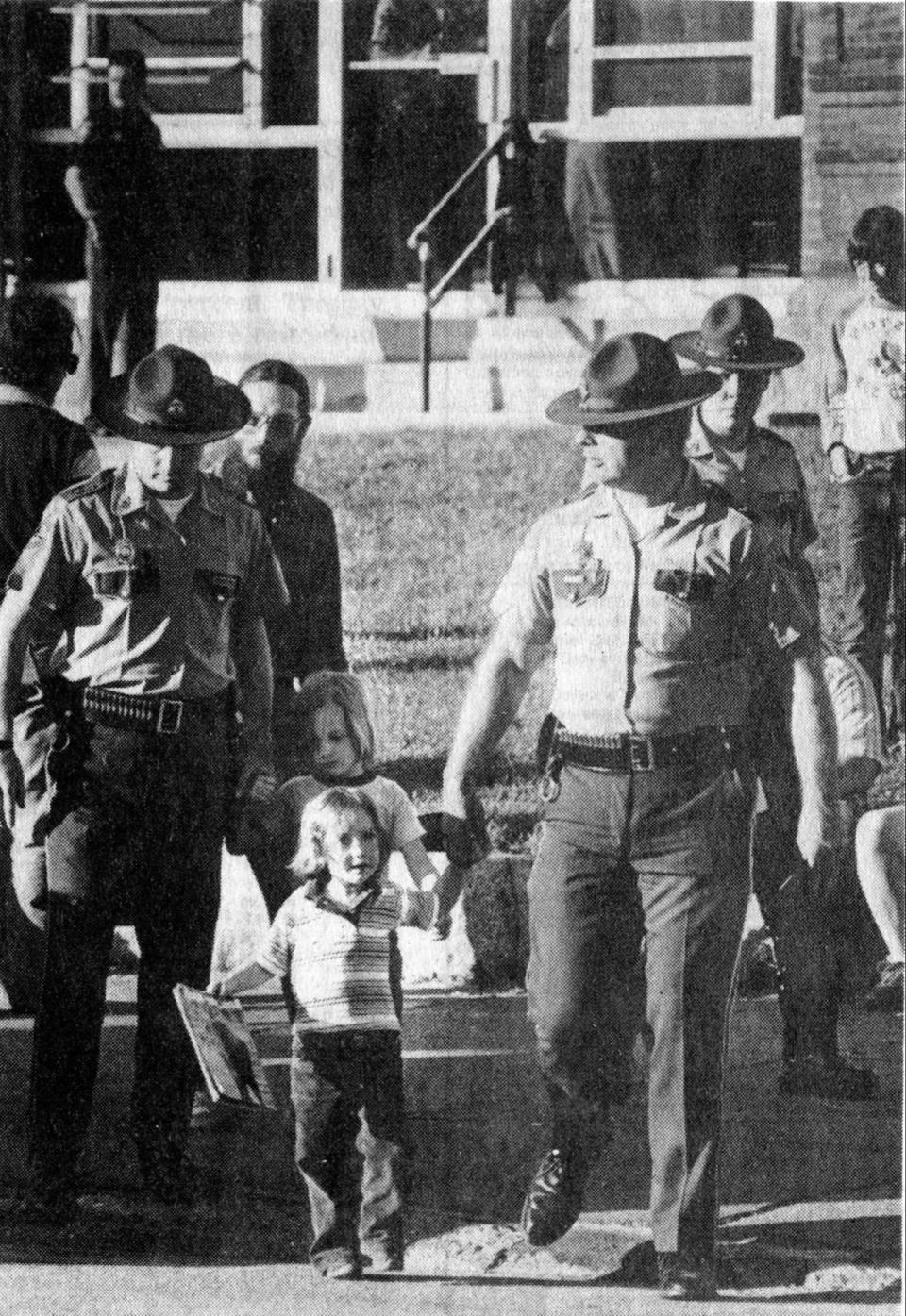 Police officer with child