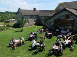community members eating togther by Tea Room