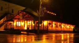 Front of deli at night