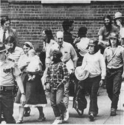Lawyer and children near courthouse